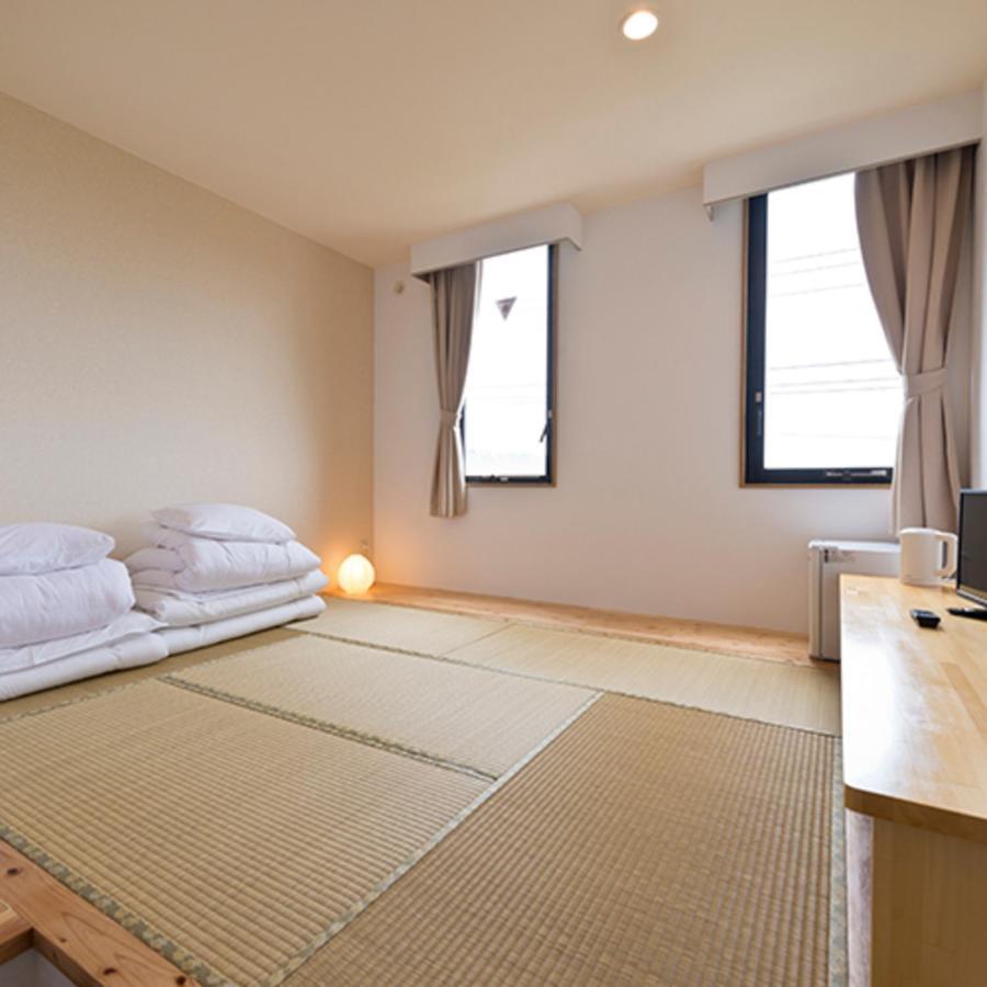 Pangoo Onna Japanese Style Hotel Bagian luar foto