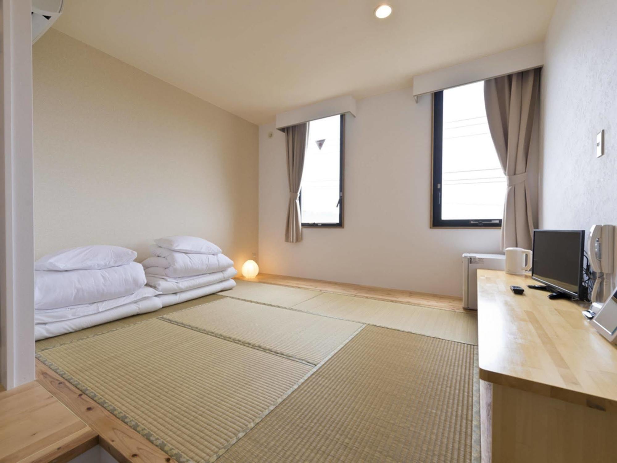 Pangoo Onna Japanese Style Hotel Bagian luar foto